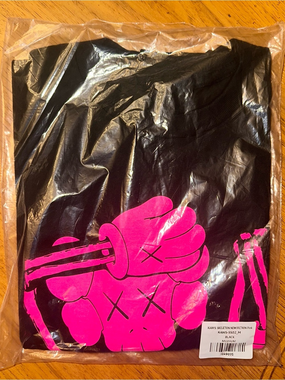 KAWS Skeleton New Fiction Pink Graphic T-Shirt Men’s Size Medium Black New